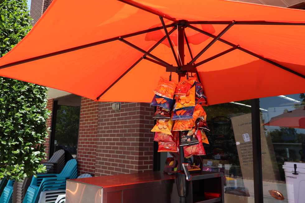 Cheesedogs menu board at a cart pop-up